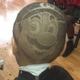 Illustration for article titled Kid Gets Crazy Mario Face Shaved Onto His Entire Head